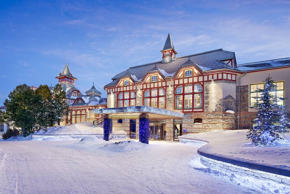 Snowy entrance shot of the Kempinski hotel 