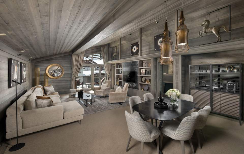 Luxurious cozy alpine lounge with sofas and seating